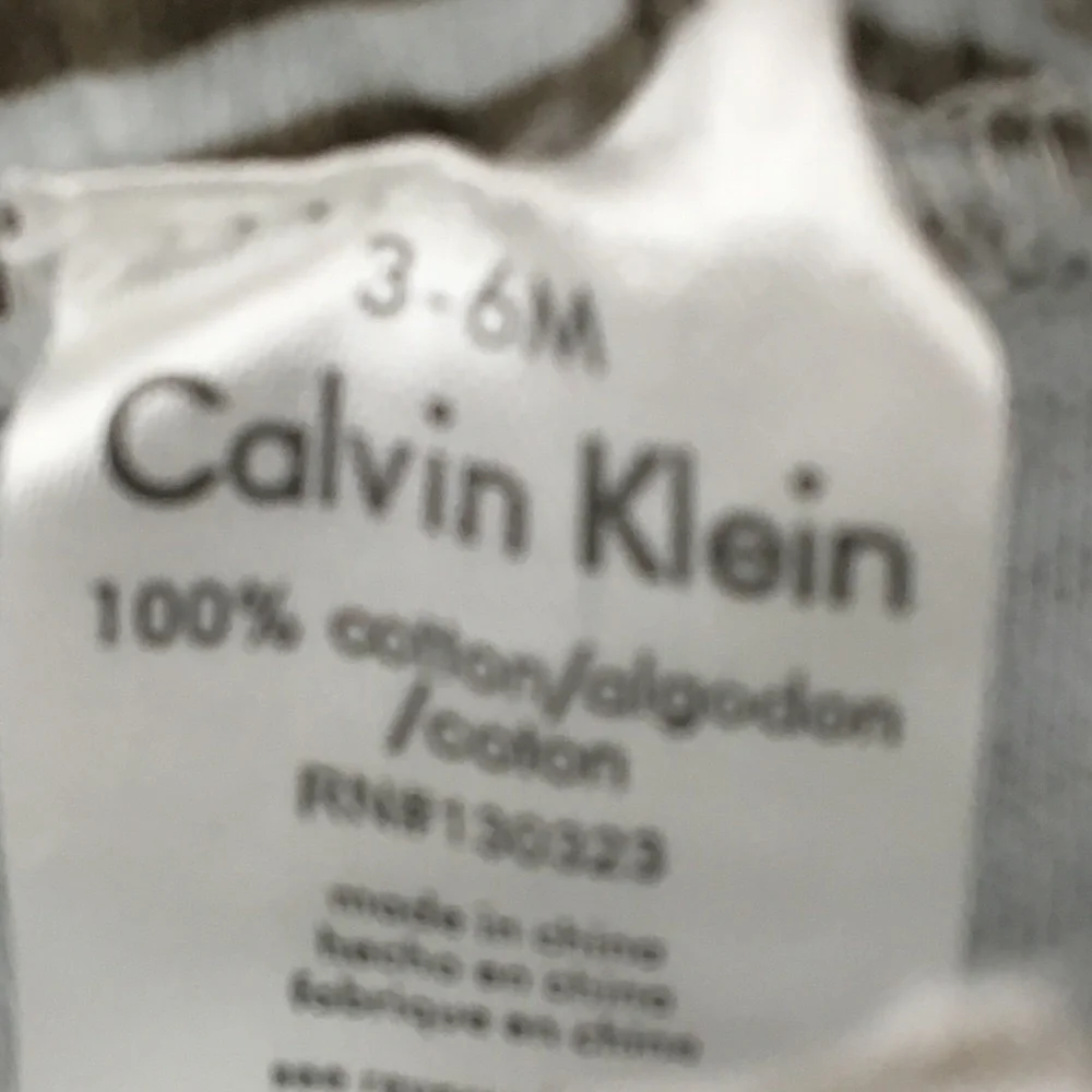 Calvin Klein baby boy cotton onesies and set